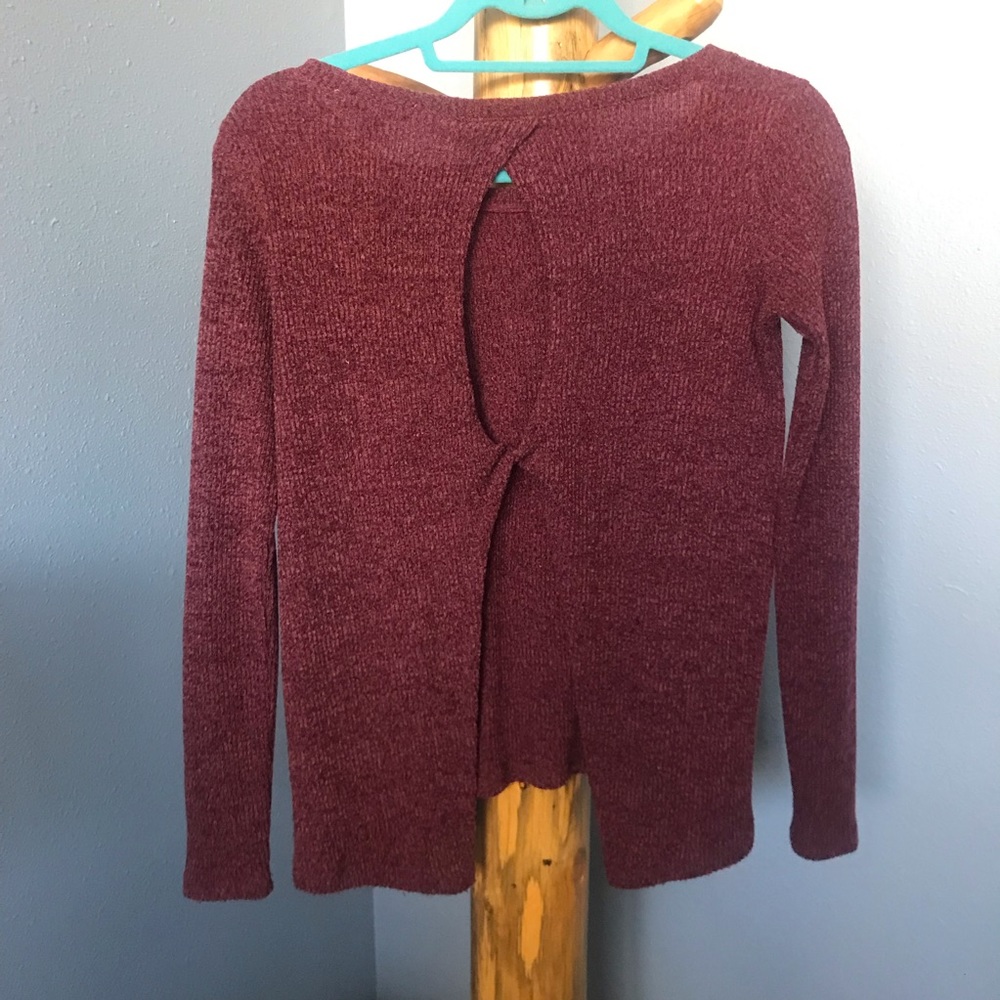 Maroon sweater, open back.